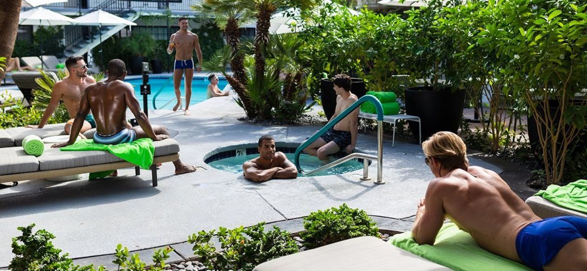 hunky-gay-men-lounge-poolside-and-in-the-jacuzzi-at-the-descanso-resort-a-gay-men-s-clothing-optional-resort.jpg